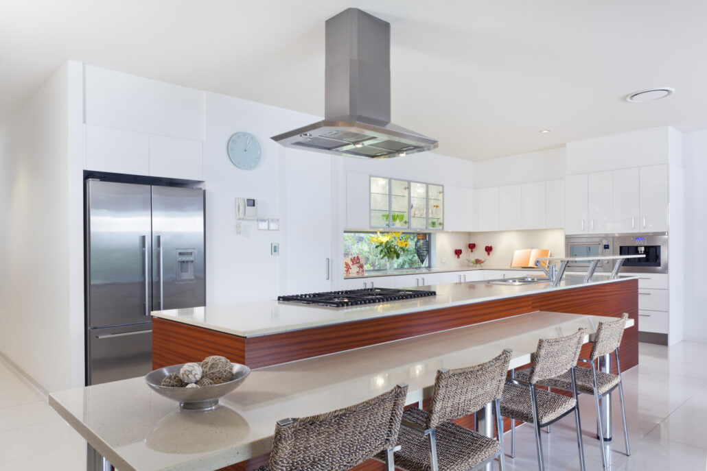 Modern kitchen with stainless steel appliances in Australian mansion